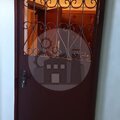 решетчатая дверь с листовым металлом и верхней вставкой